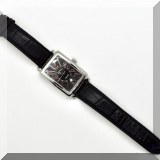 J111. E. Townsend Nantucket watch with black leather band. Clear back. Running. - $495 